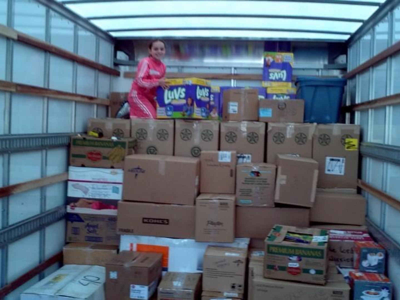 Volunteers packing and handing out supplies