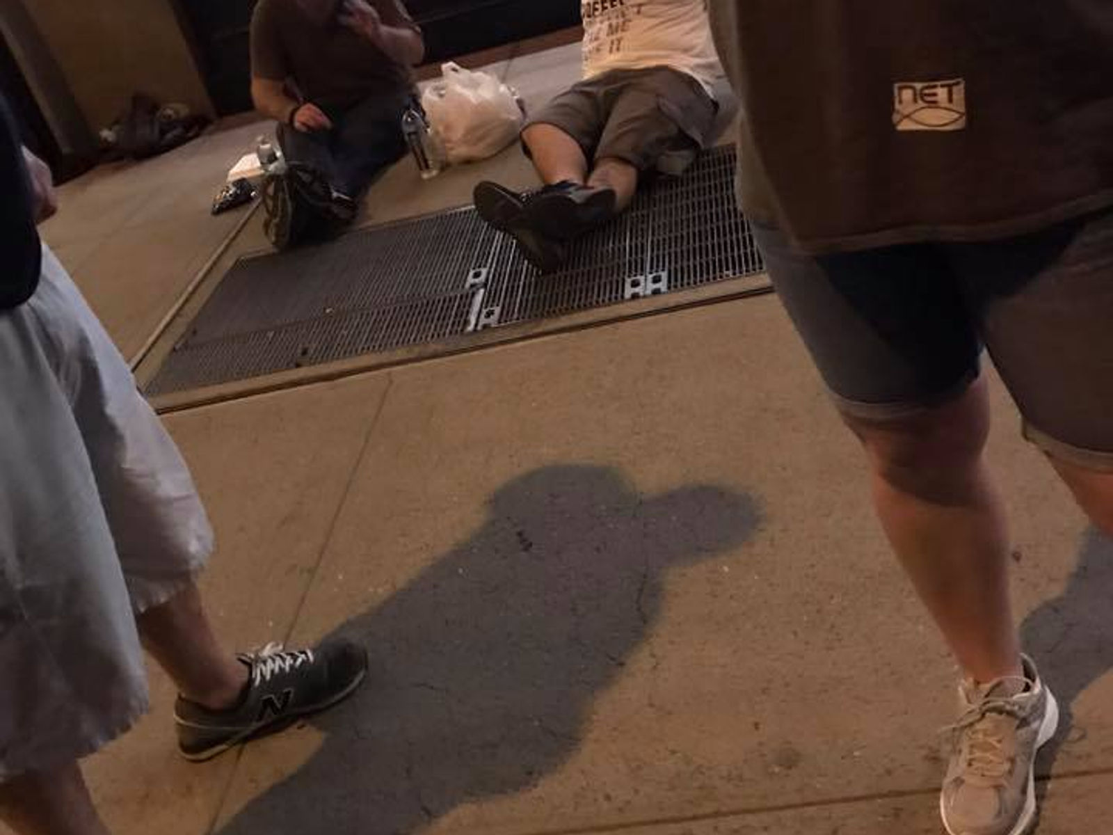 People gathering at a homeless outreach stop